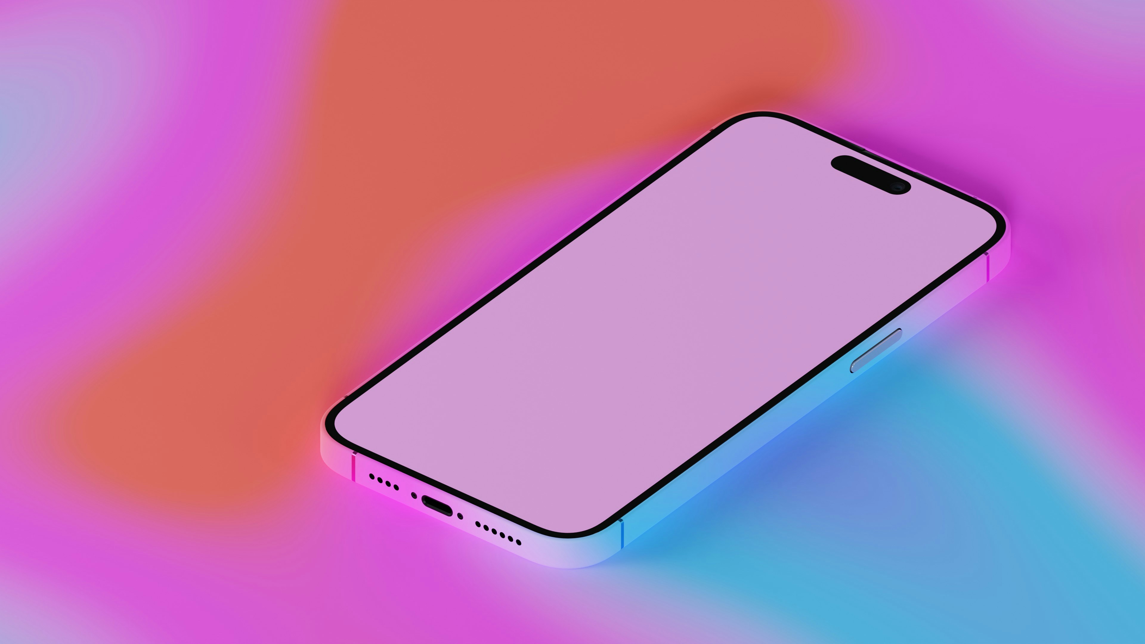 알록달록한 배경에 핑크색 화면의 스마트폰이 올려있다.